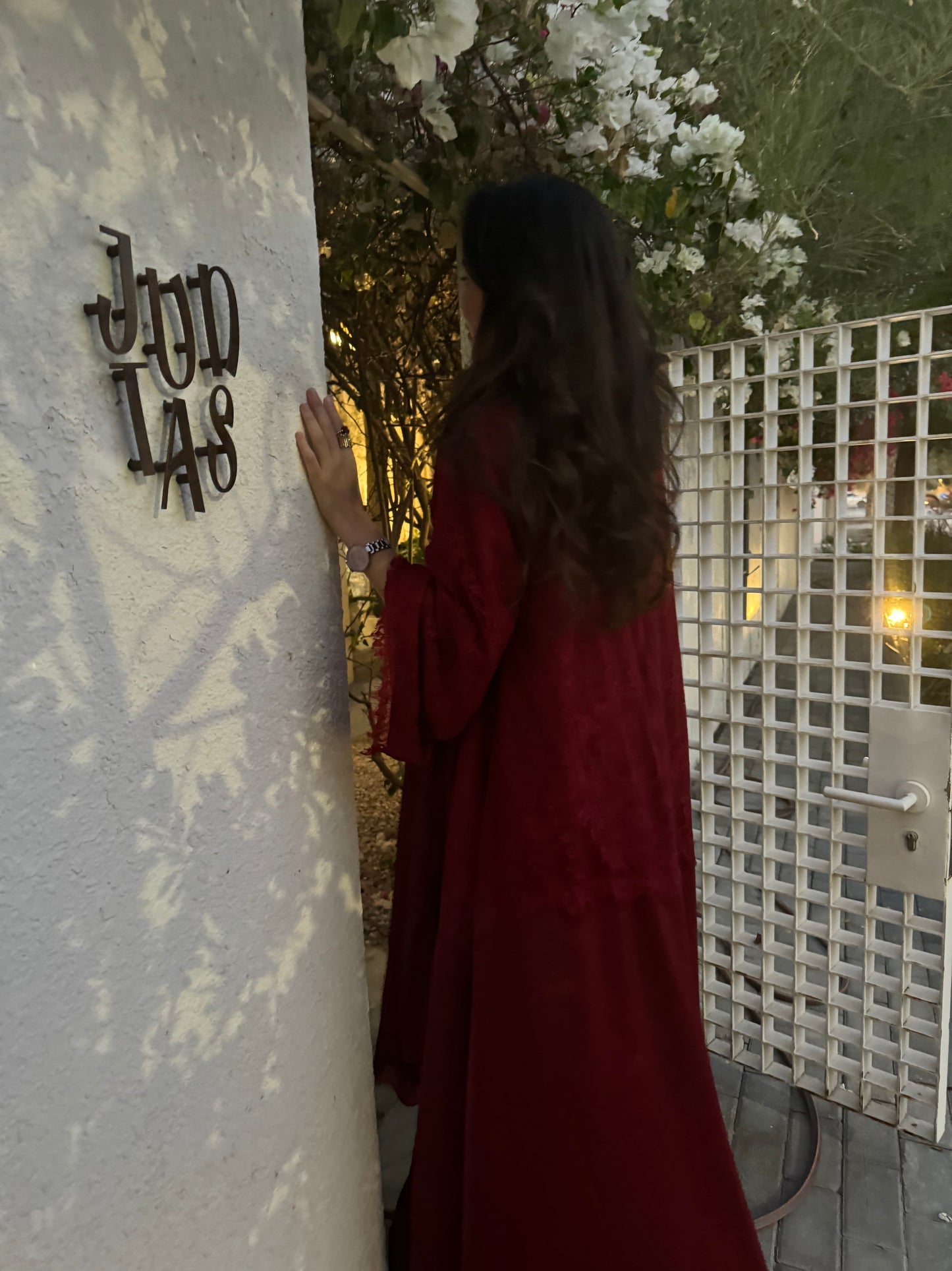 The maroon lace abaya