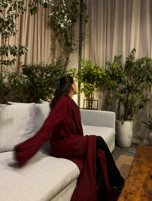 The maroon lace abaya